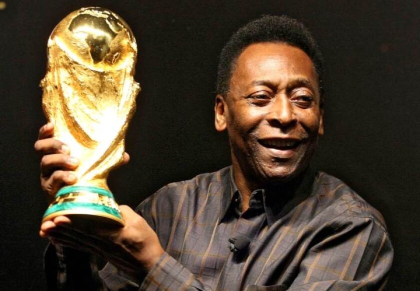 Pelé with the World Cup. Photo: File