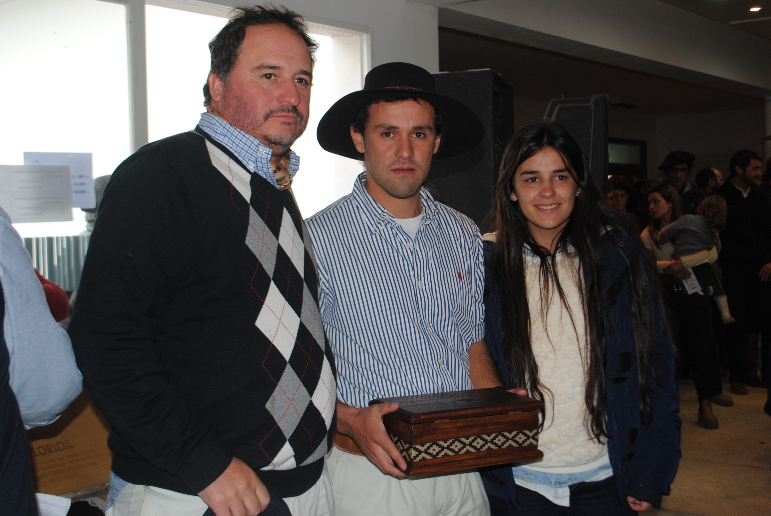 Juan Berhouet, Luciano y Valentina Capdeville.