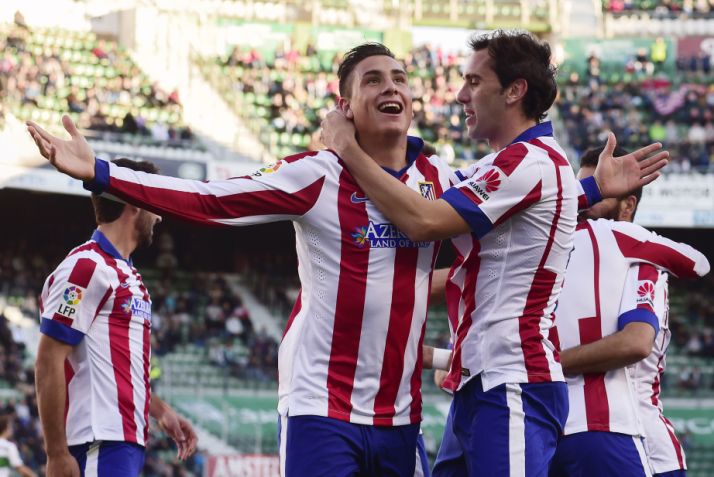 José María Giménez celebran el gol del primero ante Elche. Foto: AFP.