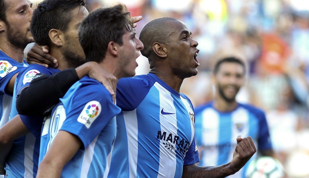 El grito de Diego Rolan en su primer tanto en Málaga. Foto: EFE