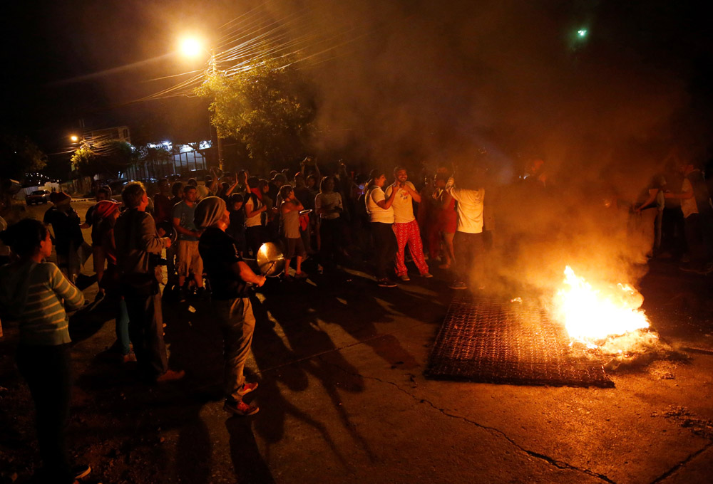 Tegucigalpa: protestas y saqueos en la capital de Honduras. Foto: Reuters