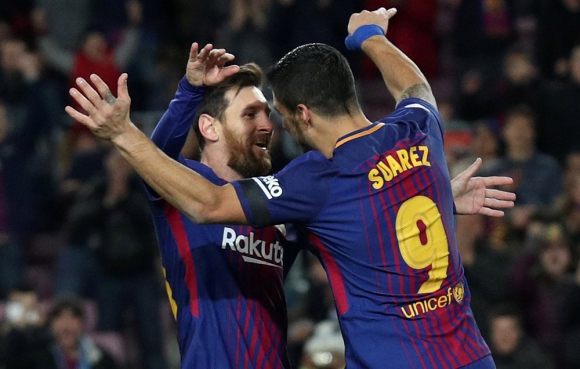 Luis Suárez y Lionel Messi. Foto: Reuters.
