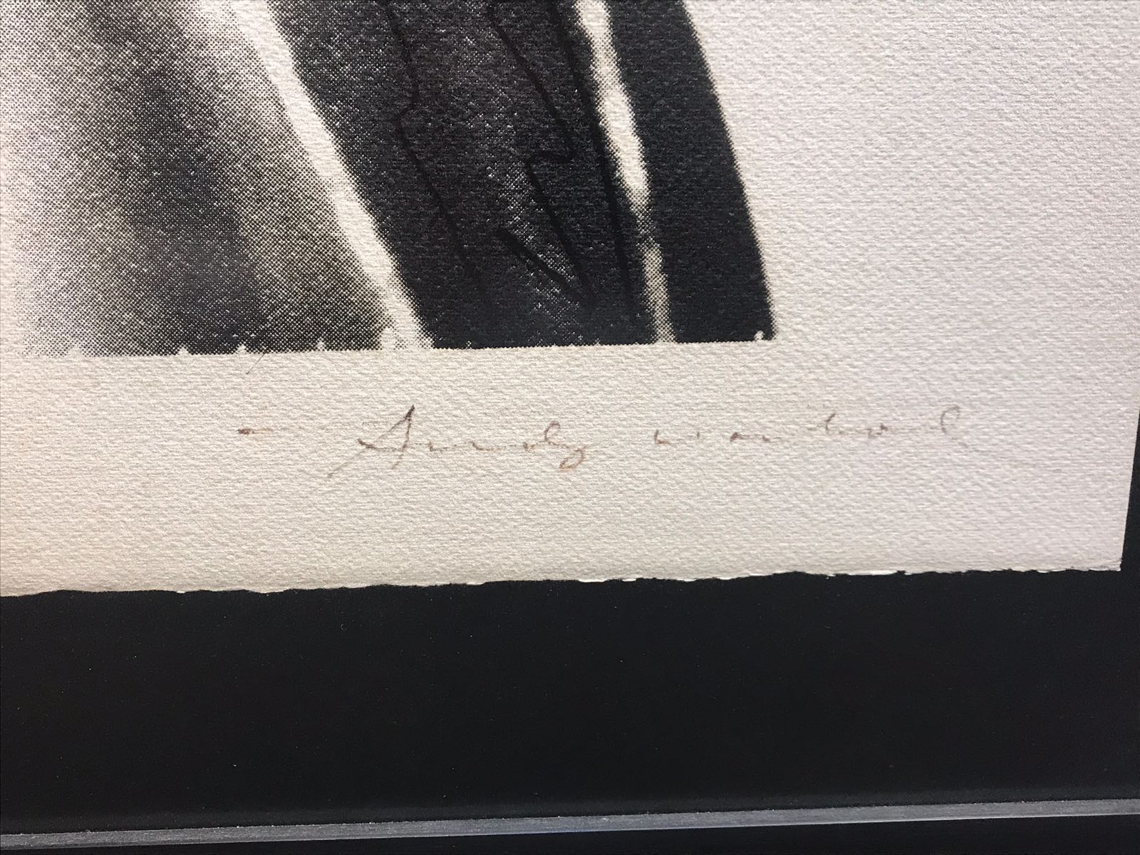 La firma de Warhol en su obra "Mick Jagger". Foto: Tazart