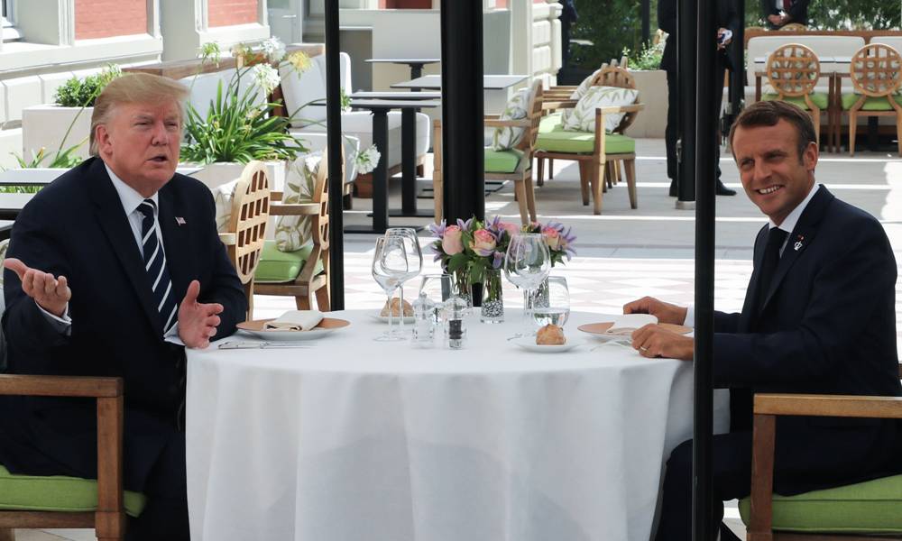 Emmanuel Macron y Donald Trump en un almuerzo previo al comienzo del G7 en Francia. Foto: AFP