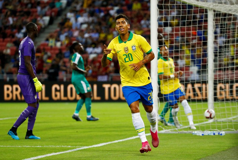 Festejo de Roberto Firmino en el primer gol ante Senegal. Foto: Reuters.