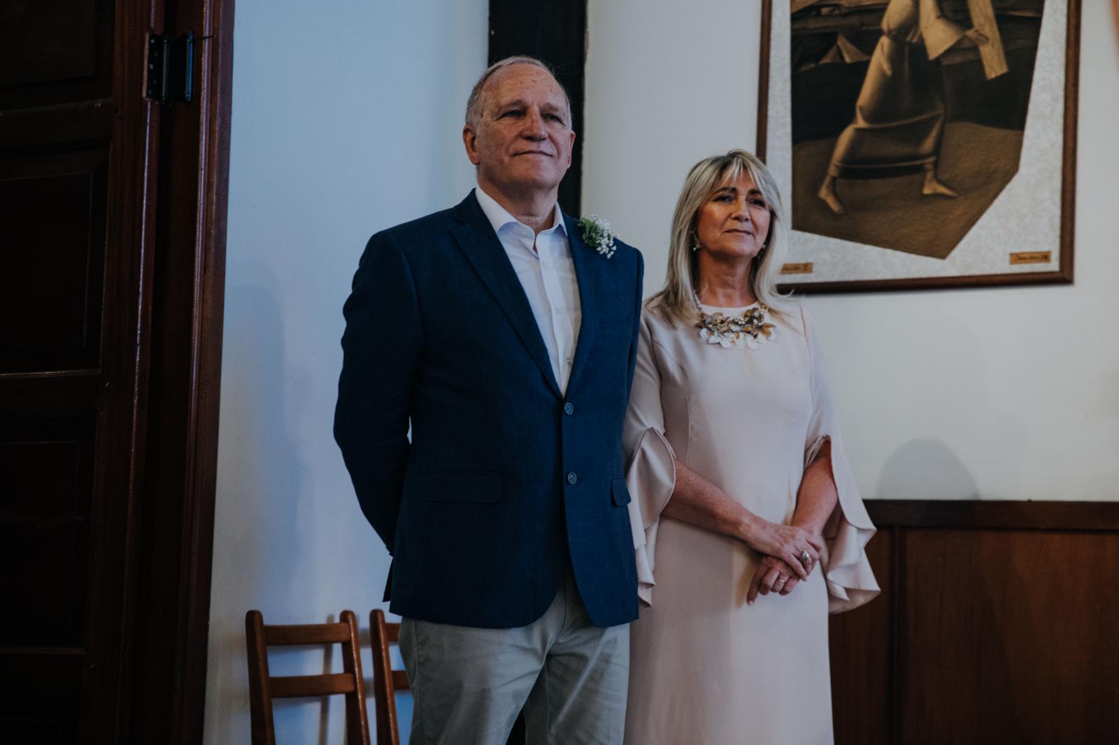 Los padrinos Fernando Damiani, Anahí Friade.