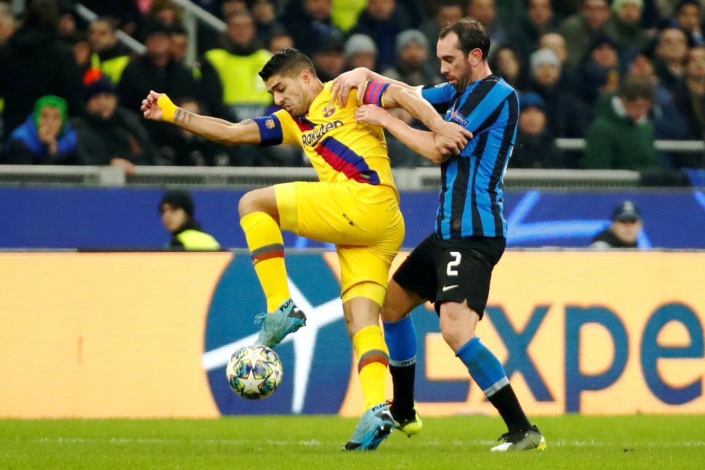 Luis Suárez y Diego Godín en Inter vs. Barcelona