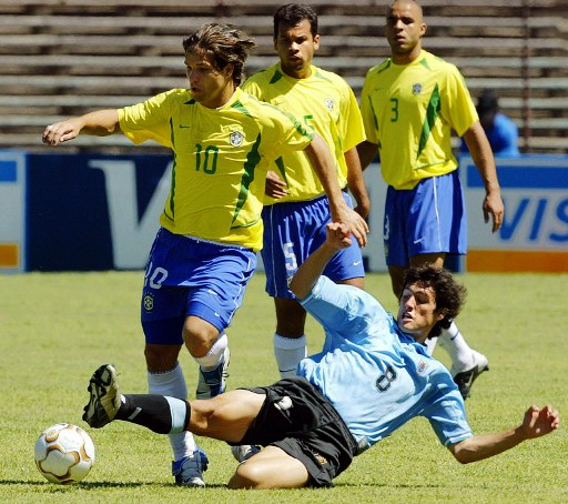 "Nacho" González en la marca frente a Diego en el Preolímpico de 2004. Foto: AUF.