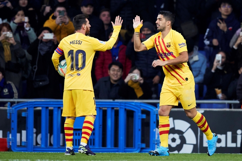 Luis Suárez y Lionel Messi celebrando uno de los goles con Barcelona. Foto: EFE.