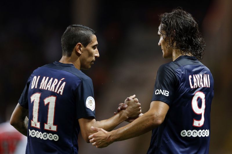 Edinson Cavani y Ángel Di María celebran en el PSG. Foto: AFP.