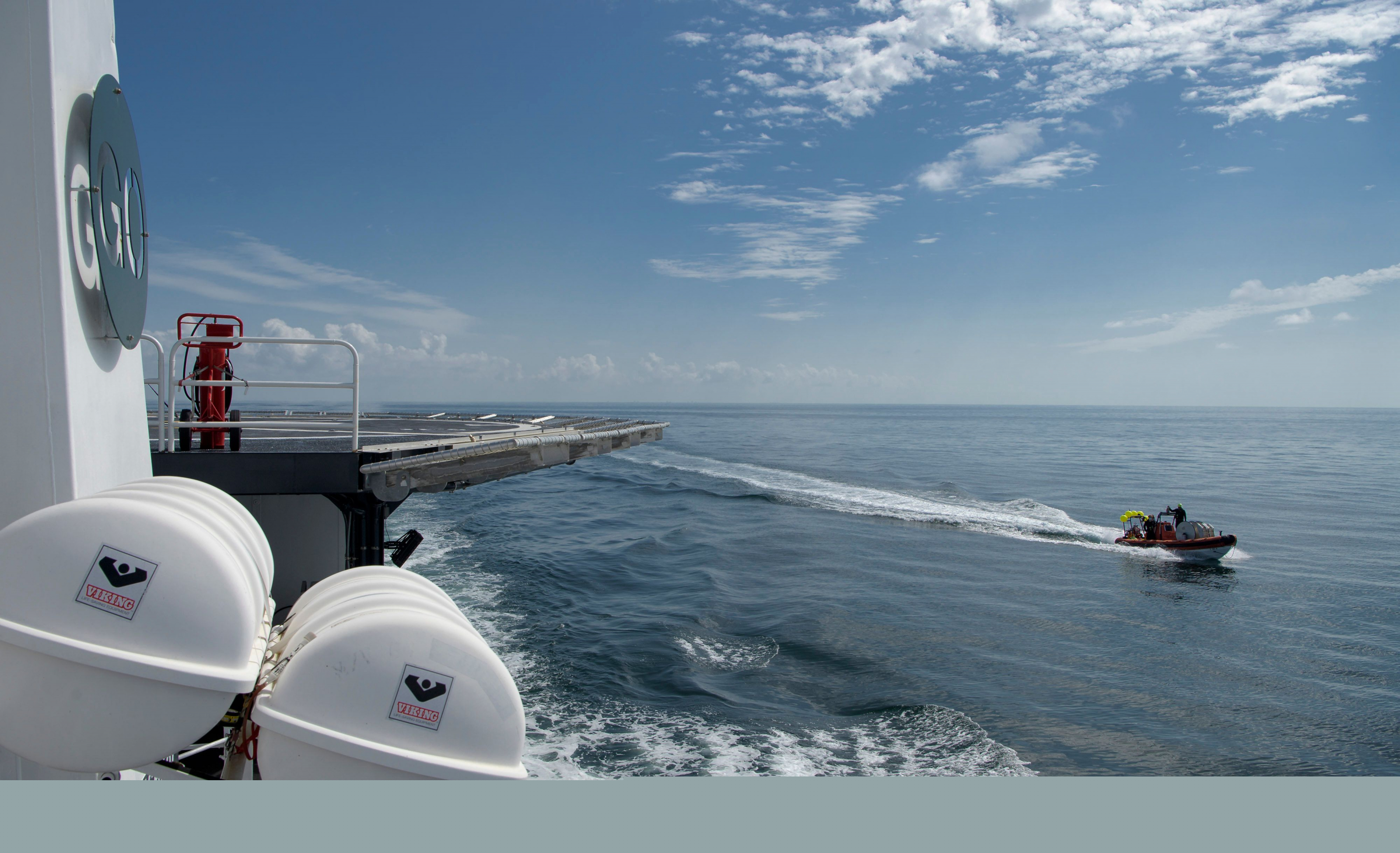 Camino a recoger la cápsula. Foto: AFP