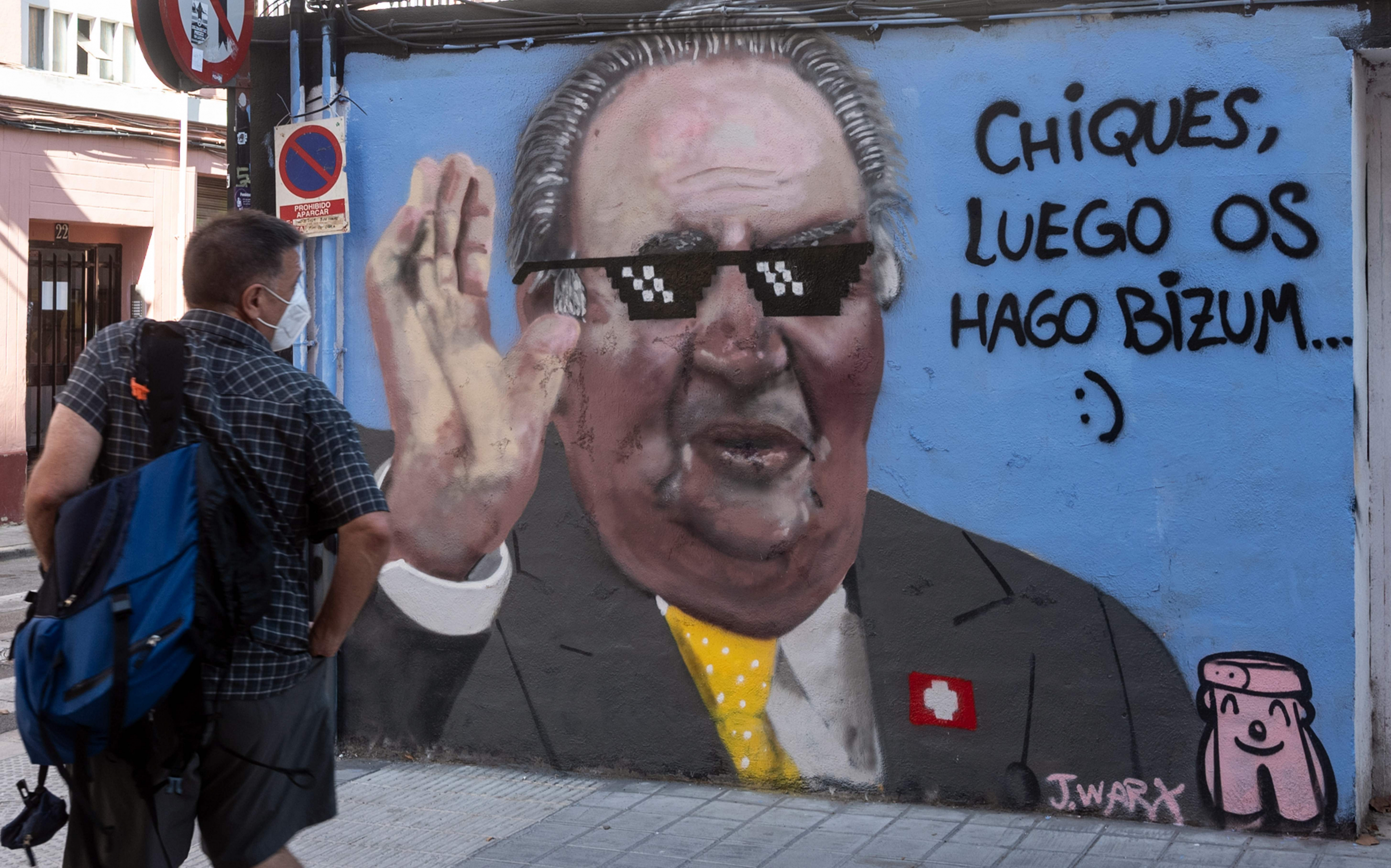 Graffiti del artista valenciano J.Warx que representa al ex rey español Juan Carlos. Foto: AFP.