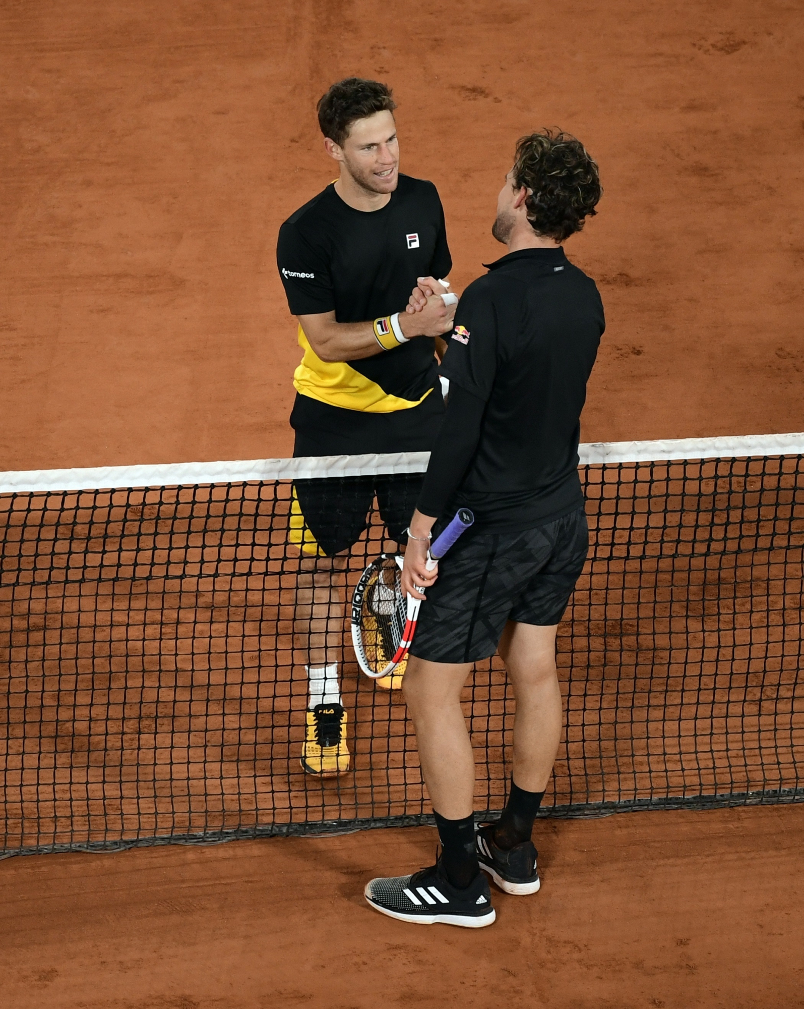 Diego Schwartzman y Dominique Thiem en Roland Garros. Foto: EFE.