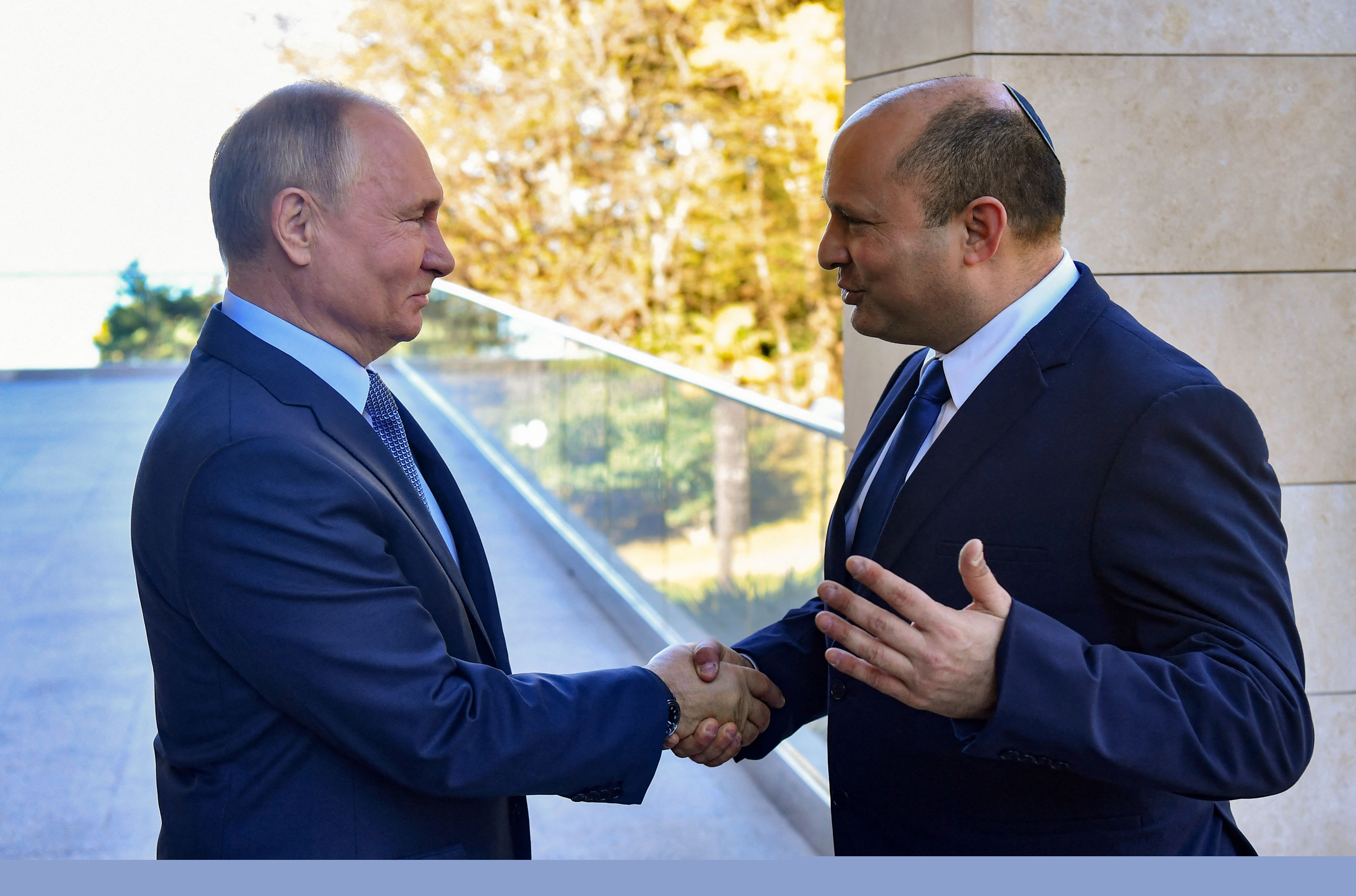 Vladimir Putin y Naftali Benet. Foto: AFP