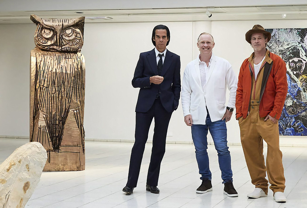 Brad Pitt junto a Nick Cave y Thomas Thomas Houseago. Foto: AFP